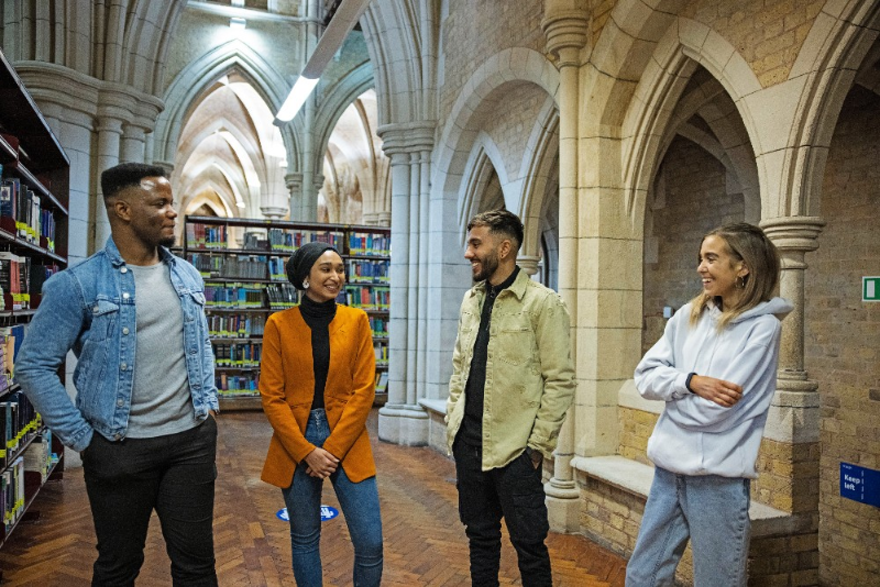 Four students in a library