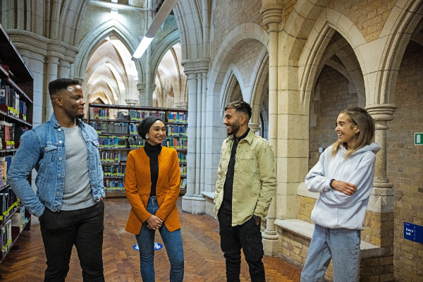 Four students in a library