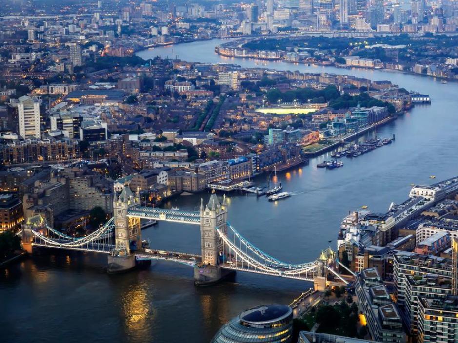 Aerial photo of the River Thames including Tower Bridge and Canary Wharf