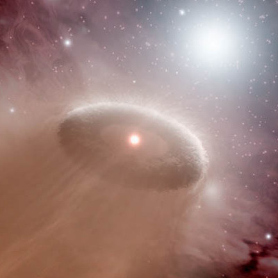 Artists impression of a protoplanetary disc being irradiated by a stellar neighbour (credit: NASA/JPL-Caltech/T. Pyle (SSC))