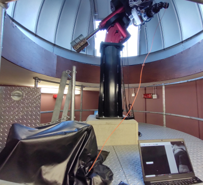 Image of the observatory with the QMSPEC experimental set-up (the instrument is under the black ‘cloth’ which is used to block stray light). (Clark Baker)