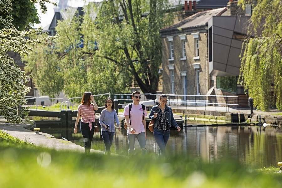 Queen Mary Summer School students enjoying a stroll along Regents canal which runs through Mile End Campus