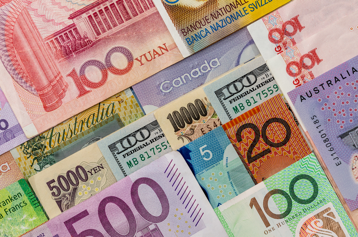Rows of random colourful banknotes