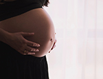 Image of a pregnant woman. Photo by freestocks on Unsplash.