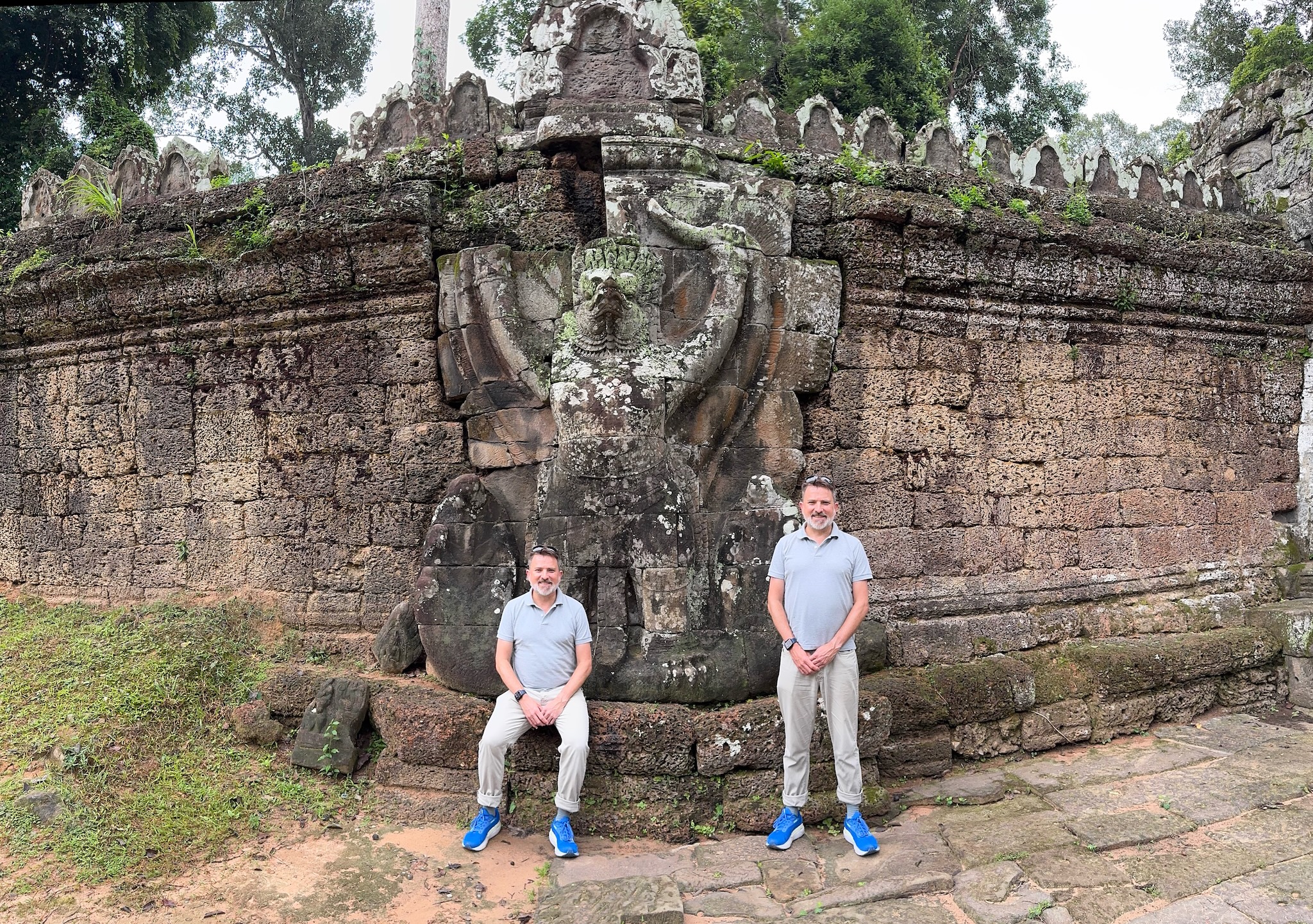 Double of Francois standing in front of a temple in Angkor park Cambodia
