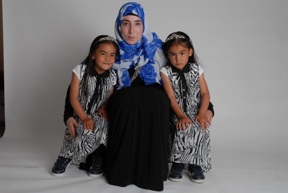A mother from Bradford with her two young daughters