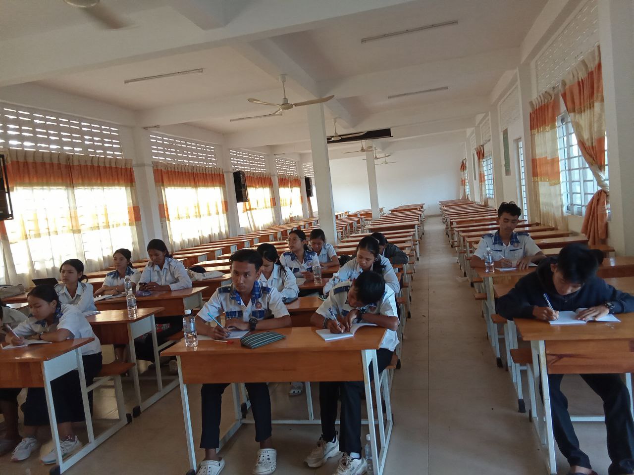 Students working in a classroom viewed from the front